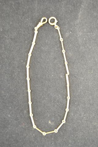 An 18ct gold partial watch chain, L34cm - approx weight 15.6g. CONDITION REPORT good condition