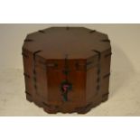 A 20th Century Korean elm octagonal cabinet with black iron mounts - diam 72cm, H50cm. CONDITION