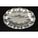A Mexican .925 sterling silver oval bowl, scroll edge, four scroll feet - W37cm, approx weight