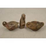 Two antique Roman/Greek terracotta oil lamps, one missing spout - largest W9cm; together with a