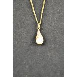 An 18ct gold necklace chain - L40cm, with 18ct gold mounted pearl pendant, together with a pair of