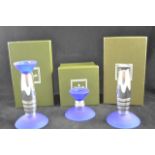 A boxed Christophle, Paris, plated candlestick with blue glass base - H15cm, the matching