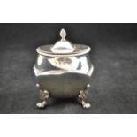 A silver tea caddy with gadrooned border and four paw feet, Birmingham 1901 - approx weight 169g/5.4