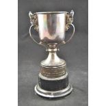 A 20th century trophy cup, lions and crowns to twin handles, uninscribed, London 1938, H Philips -