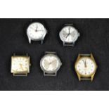 A collection of five vintage watch heads - Avalon, Bulova, Rytima, Ruhla and Timex.