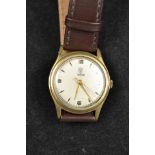 A gentleman's vintage Tudor wristwatch in gilt and stainless steel case, dial with baton numerals