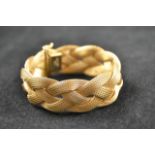 An 18ct gold plaited mesh bracelet - approx weight 48.4g. CONDITION REPORT generally good condition,