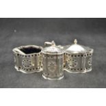 A mid 20th Century silver Georgian style three piece cruet set, maker A Chick and Sons Ltd, London