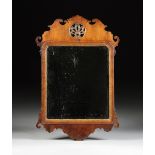 A QUEEN ANNE CARVED WOOD AND PARCEL GILT MIRROR, 18TH CENTURY, of rectangular form with a shaped