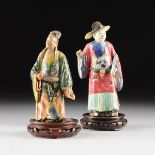 TWO CHINESE POLYCHROME GLAZED EARTHENWARE DEITIES, EARLY 20TH CENTURY, one wearing a scholars cap