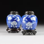 A PAIR OF CHINESE DIMINUTIVE BLUE AND WHITE LIDDED JARS, 20TH CENTURY, of traditional form and sides