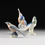 A COLLECTION OF THREE ROYAL COPENHAGEN POLYCHROME PAINTED PORCELAIN BIRD FIGURES, GREEN AND BLUE