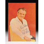 A RED SKELTON AUTOGRAPHED COLOR PHOTOGRAPH, the color photograph of the comedian in casual attire