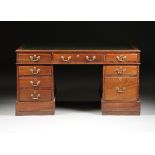 A GEORGE III STYLE MAHOGANY PEDESTAL PARTNERS DESK, 19TH CENTURY, the rectangular top centering a