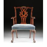 A CHIPPENDALE STYLE CARVED MAHOGANY AND NEEDLEWORK UPHOLSTERED ARMCHAIR, SECOND HALF 19TH CENTURY,