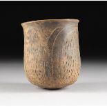 A PRE-COLUMBIAN TERRA COTTA VESSEL, CHAVÃN, PERU, 1000 B.C.- 400 B.C., gray black ware cylinder