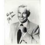 A JOHNNY CARSON AUTOGRAPHED AND INSCRIBED 8" X 10" BLACK AND WHITE PHOTOGRAPH, a publicity image