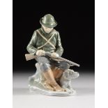 A ROYAL COPENHAGEN POLYCHROME PAINTED PORCELAIN FIGURE, 20TH CENTURY, "Hunter and Dog," no. 1087,