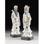 A PAIR OF CHINESE BLUE AND WHITE PORCELAIN FIGURES OF BEARDED SAGES, MODERN, each modeled in a