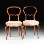 A PAIR OF VICTORIAN BALLOON BACK CARVED ROSEWOOD SIDECHAIRS, SECOND HALF 19TH CENTURY, each with