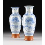 A PAIR OF CHINESE BLUE AND WHITE PORCELAIN VASES, MODERN, each of ovoid form and sides centering