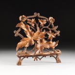 A CONTINENTAL RETICULATED CARVED WOOD BOOK STAND, POSSIBLY GERMAN BLACK FOREST, LATE 19TH/EARLY 20TH