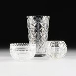 A GROUP OF THREE VARIOUS CUT AND MOLDED GLASS TABLE ARTICLES, MODERN, comprising a tall