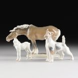 A COLLECTION OF THREE ROYAL COPENHAGEN POLYCHROME PAINTED PORCELAIN FIGURES OF ANIMALS, GREEN AND