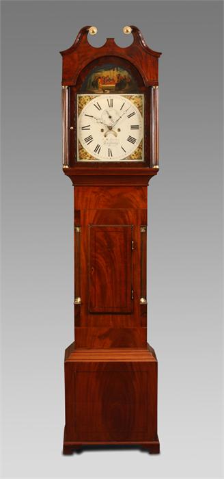 J M TUCKER, TROWBRIDGE A George IV inlaid figured Mahogany eight day LONGCASE CLOCK with reeded