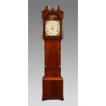 J M TUCKER, TROWBRIDGE A George IV inlaid figured Mahogany eight day LONGCASE CLOCK with reeded