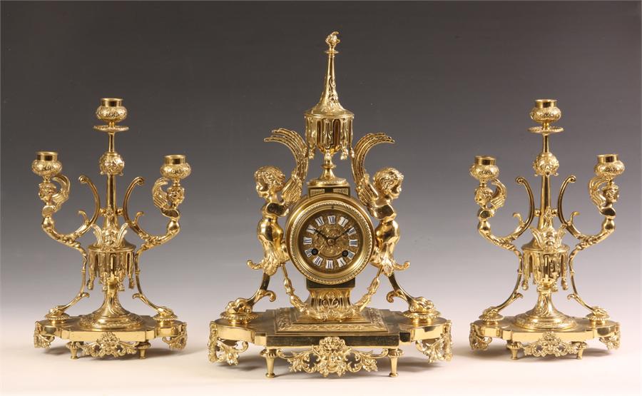 A good late 19th Century French Cast Brass three piece MANTEL GARNITURE CLOCK SET with three