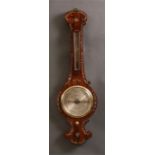 MANSFIELD, SHAFTESBURY An early Victorian mother of pearl inlaid Rosewood WHEEL BAROMETER with