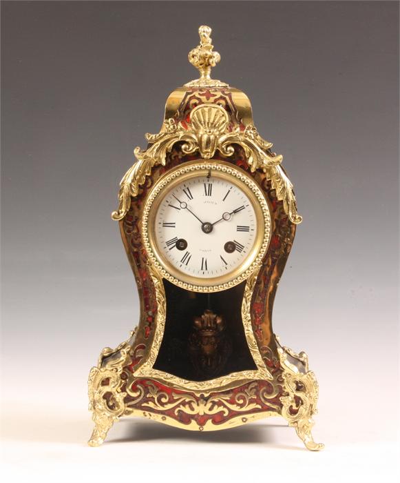 A late 19th Century Brass inlaid Red Tortoiseshell and Ebonized ground French rococo Boulle’