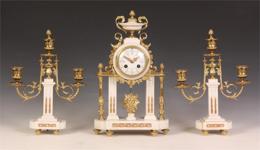 A stylish late 19th Century Cast Brass and White Marble THREE PIECE MANTEL GARNITURE CLOCK SET