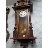 Good quality German Walnut cased Striking clock with turned, carved and fluted detail Condition –