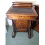 19thC Walnut Davenport with fitted interior, applied leather slope above turned column supports,