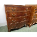 Reproduction Serpentine fronted chest of 4 drawers with brass drop handles and splayed bracket feet,