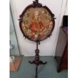 Good quality Regency Pole screen of carved detail, turned Tripod base, inset Portrait embroidered