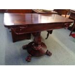 Fine William IV Rosewood Tea table on Elongated vase support, Circular base on 4 carved paw feet,