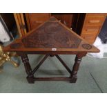 Highly Carved Oak Triangular Cricket table decorated with Fishes, turned supports and straight