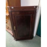 Georgian Oak Wall Corner cabinet with fluted sides and panel door Condition - Wear commensurate with