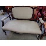 Edwardian Mahogany framed 2 seater sofa with carved ribbon back, scroll arms and cabriole legs,