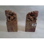 Good Quality Pair of Late 19thC Red Soapstone seals decorated with Dragons and waves Condition –