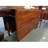 Large Mahogany Pembroke table on turned tapering legs and brass caster feet Condition - Good