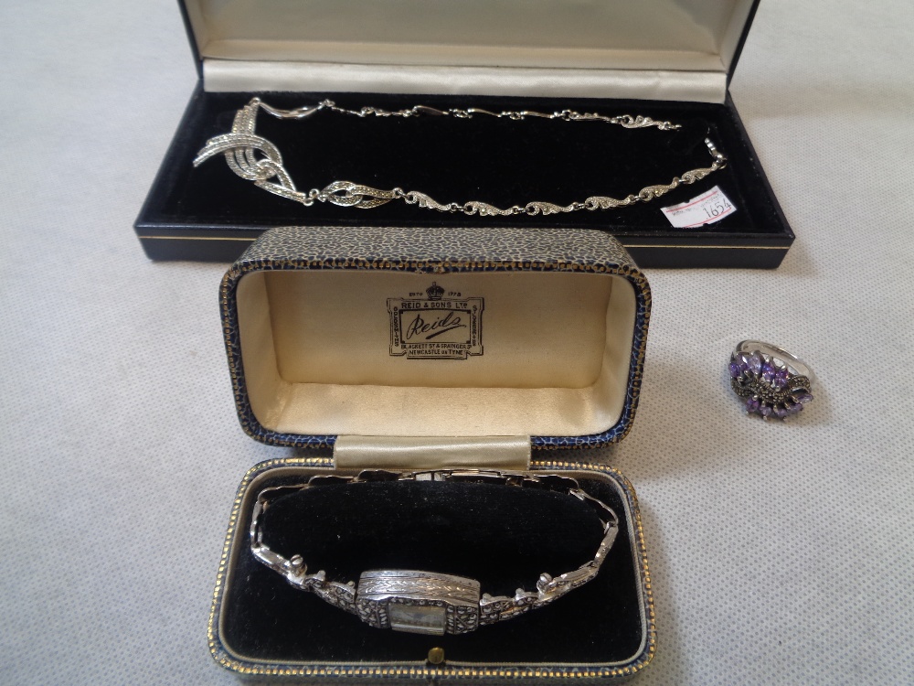 Edwardian Silver Marcasite set ladies cocktail watch, Stone set dress ring and a Marcasite