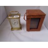 French Brass Carriage clock with Roman Numeral face and Brown leatherette travelling case, Condition