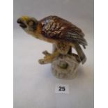 Italian Capodimonte figure of a Bird of Prey on tree base, blue underglaze mark and impressed