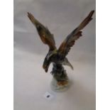 Porzellanfiguren Gräfenthal Figure of a Eagle with outstretched wings on rock base, 25cm in Height