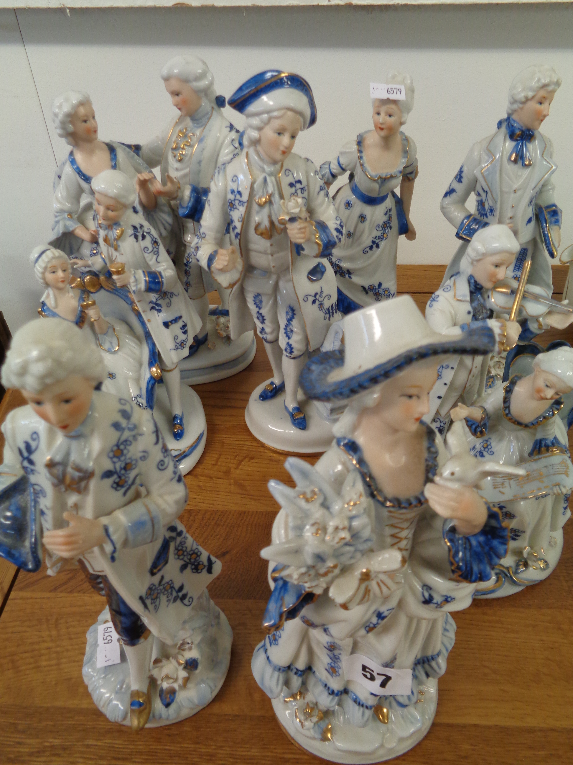 8 20thC Blue & White Porcelain gilded figurines in the manner of Meissen, Condition - some chipping