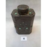 Arts & Crafts Tin Overlay Tea Caddy of Octagonal form with raised floral decoration set with